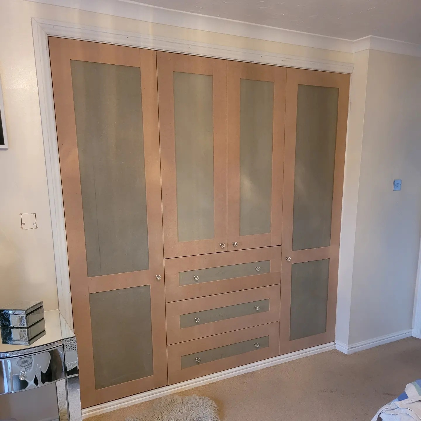 Shaker style fitted wardrobe and drawer unit in a bedroom in Pewsey